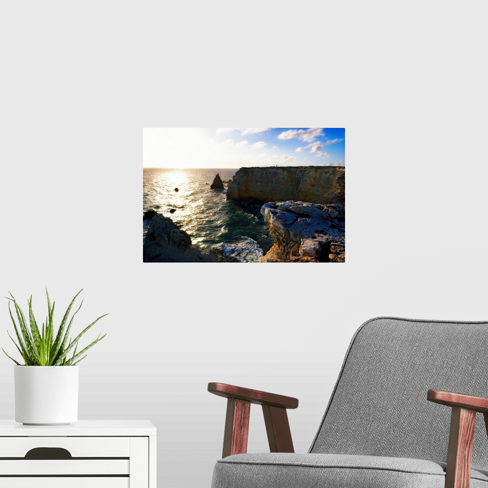 A modern room featuring Sunset at the Cliffs Of Cabo Rojo, Puerto Rico