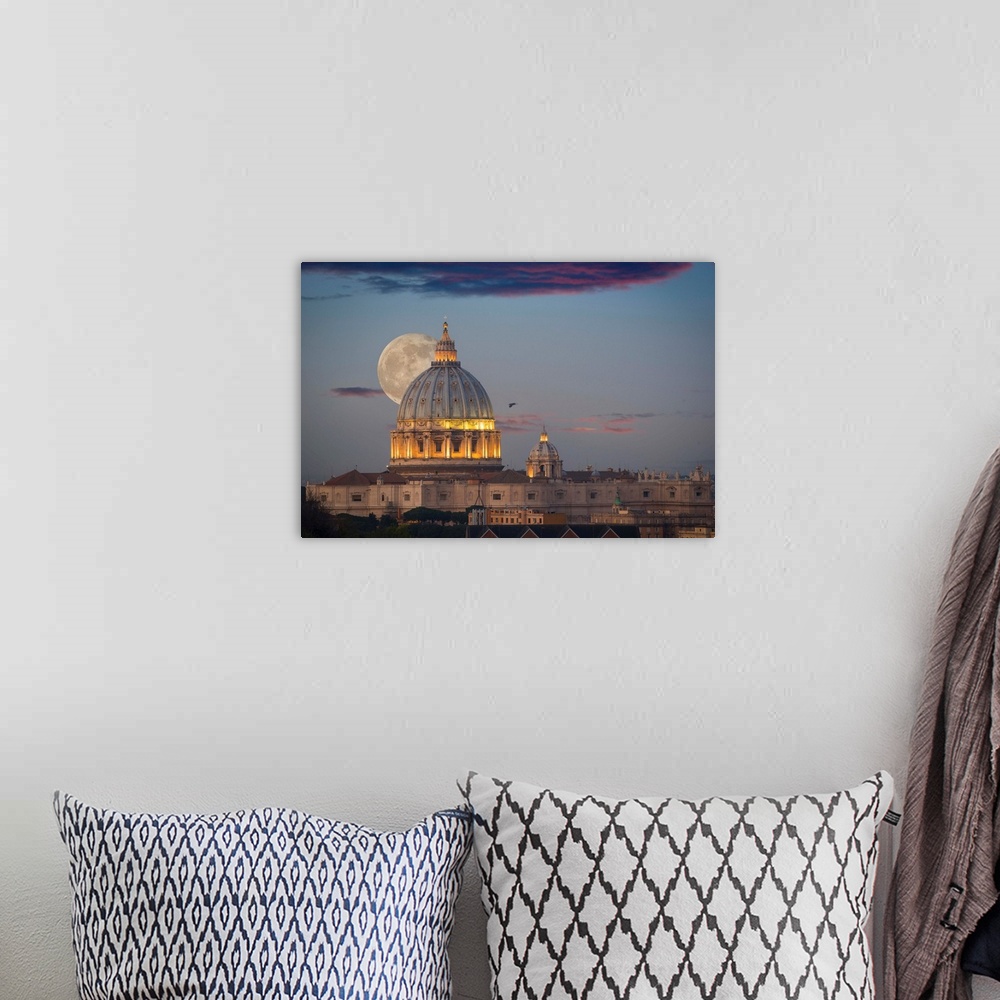 A bohemian room featuring Fine art photograph of the moon rising right behind St. Peter's Basilica in Rome.