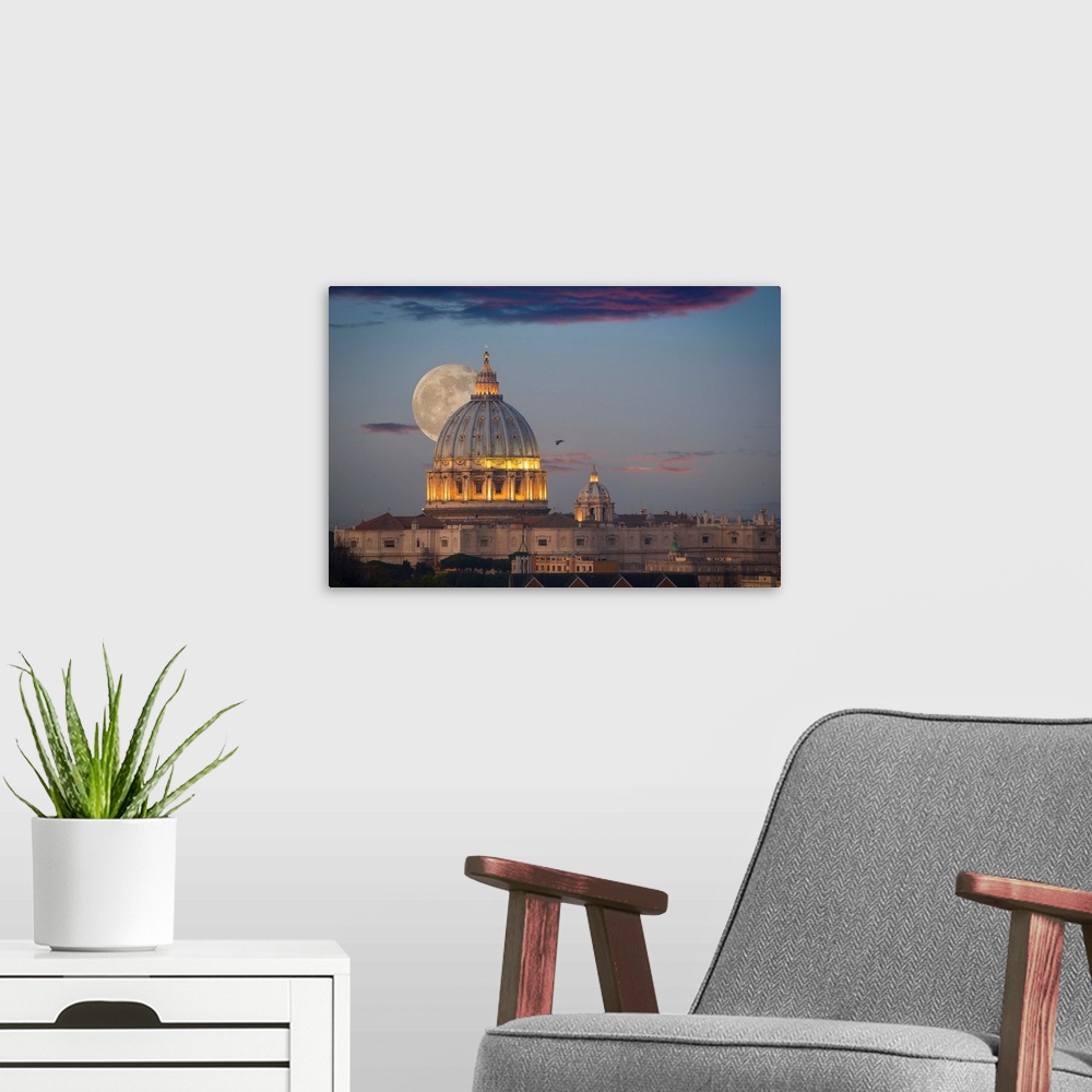 A modern room featuring Fine art photograph of the moon rising right behind St. Peter's Basilica in Rome.