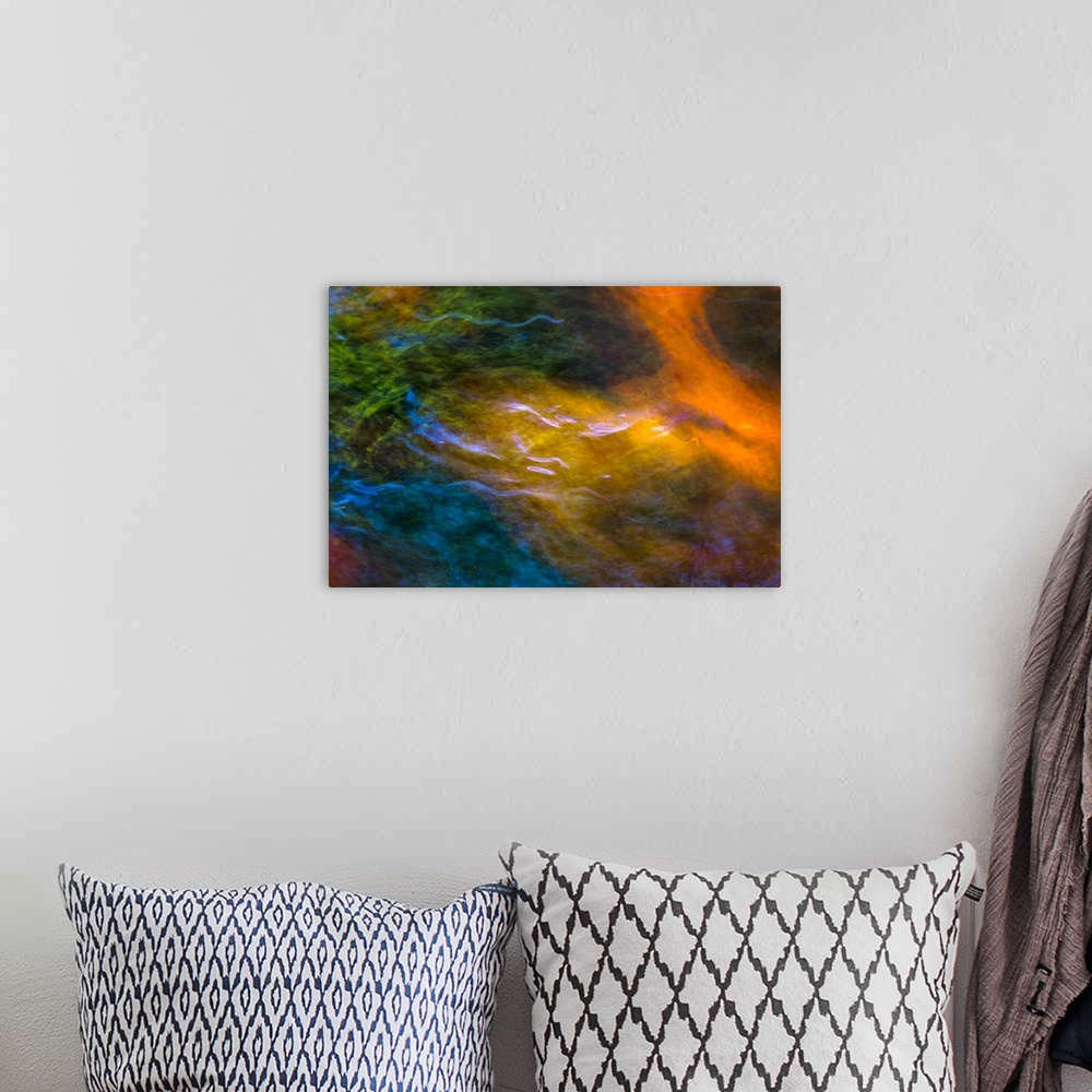 A bohemian room featuring Photograph of colorful rippling water.