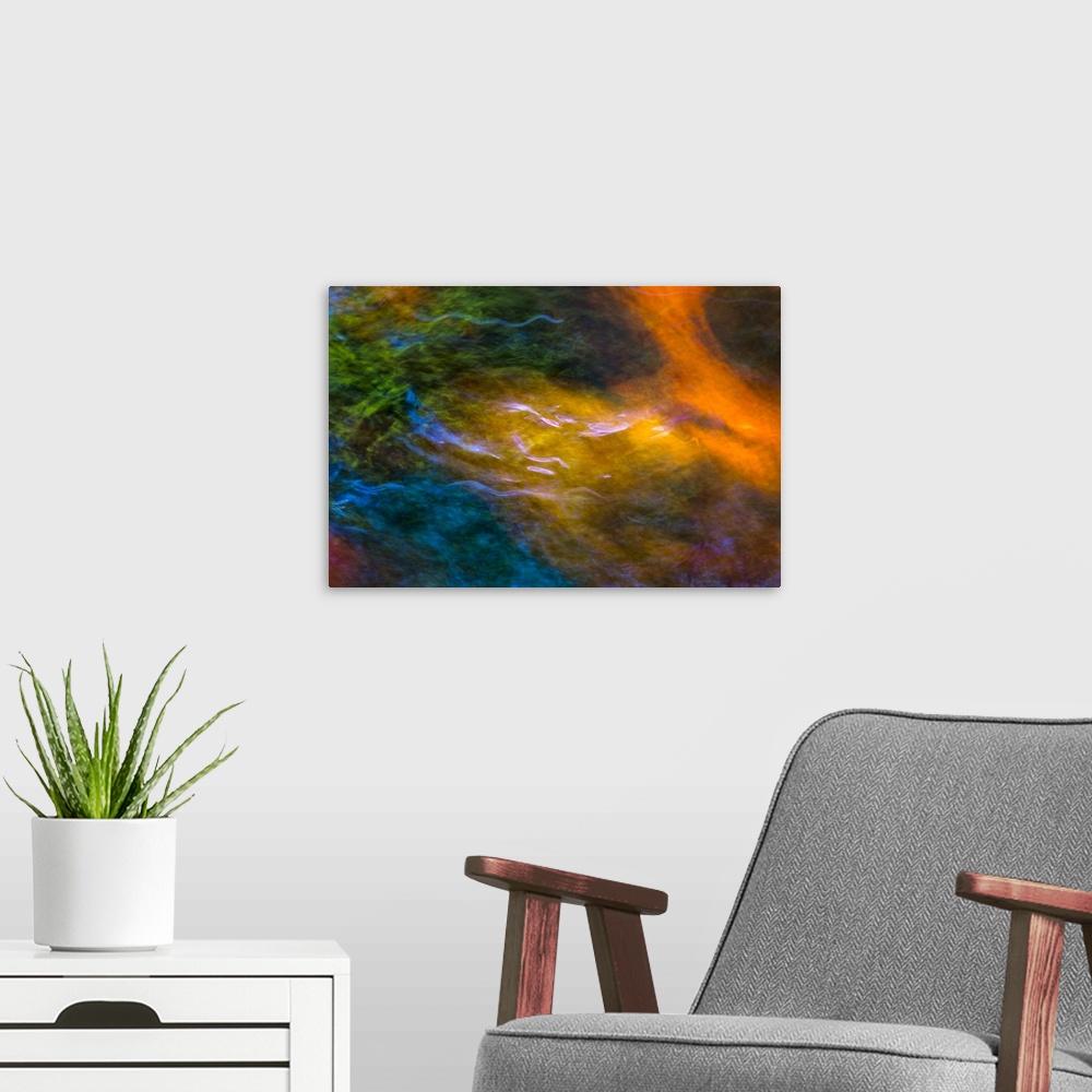 A modern room featuring Photograph of colorful rippling water.