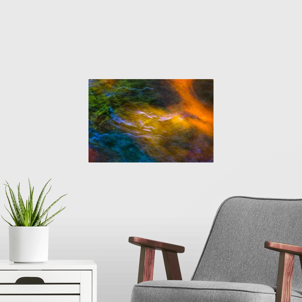 A modern room featuring Photograph of colorful rippling water.