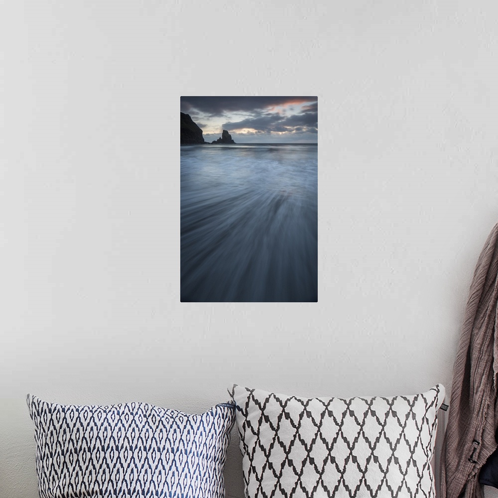 A bohemian room featuring A dramatic sunset seascape from Talisker Bay, Isle of Skye, Scotland in soft blue greys and pinks...