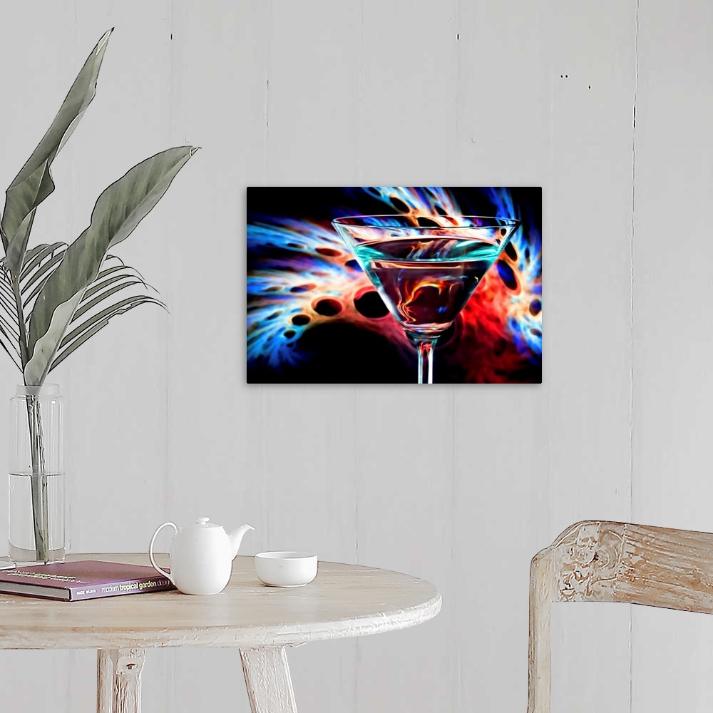 A farmhouse room featuring Full martini glass in front of a psychedelic  colorful design.