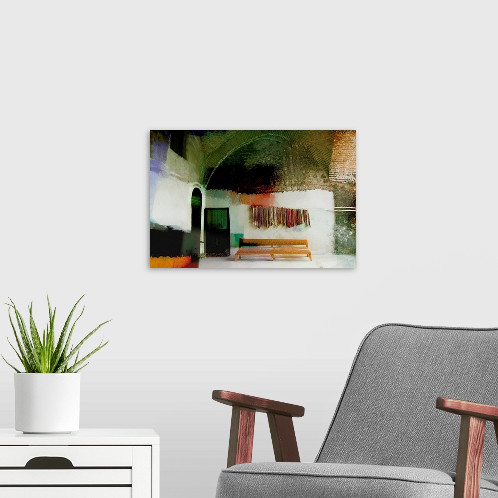 A modern room featuring Altered photograph of building with bundles of yarn hanging on the wall over a bench.