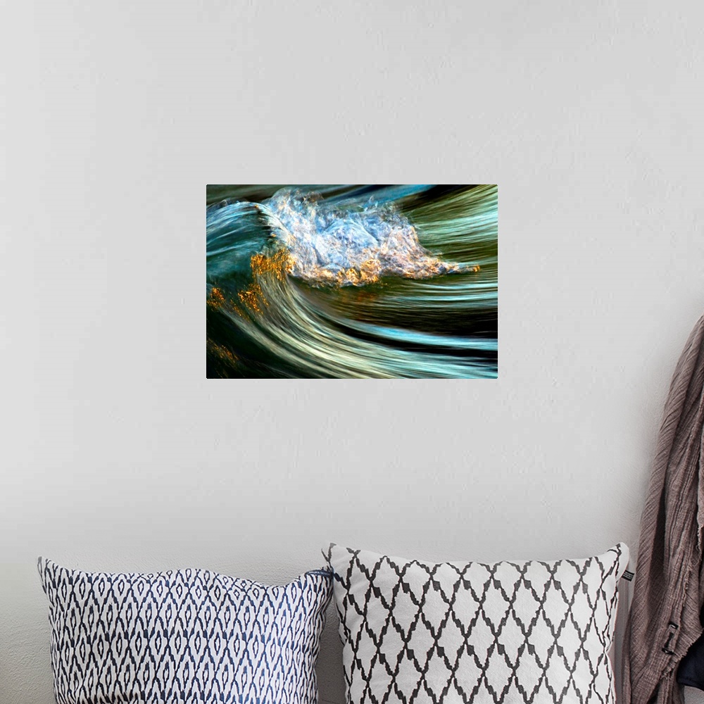 A bohemian room featuring Big photograph focuses on the crest of a wave as it begins to fold over and crash against itself.