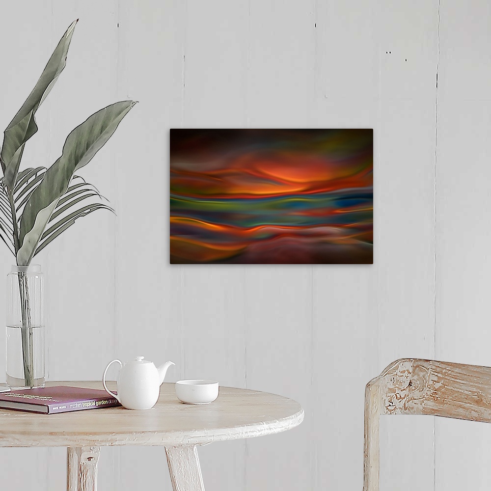 A farmhouse room featuring Abstract photograph of blurred and blended colors and flowing lines in shades of orange and blue.
