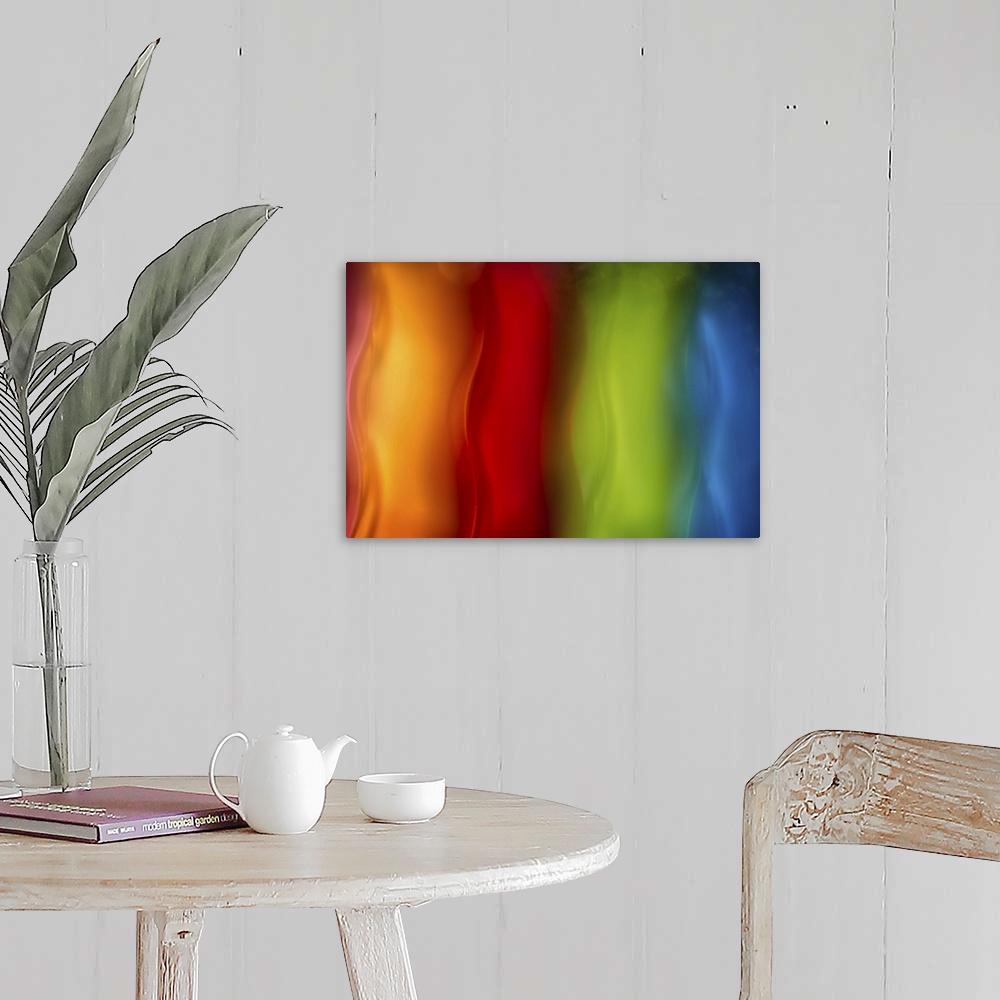 A farmhouse room featuring Abstract photograph in orange, red, green, and blue vertical layers.