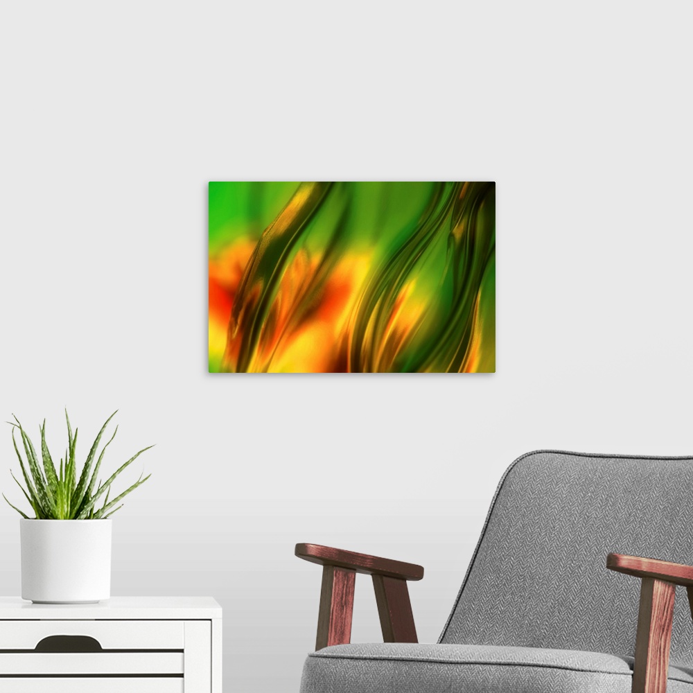 A modern room featuring Horizontal, abstract photograph of angled, transparent waving lines.  The background is a blur of...