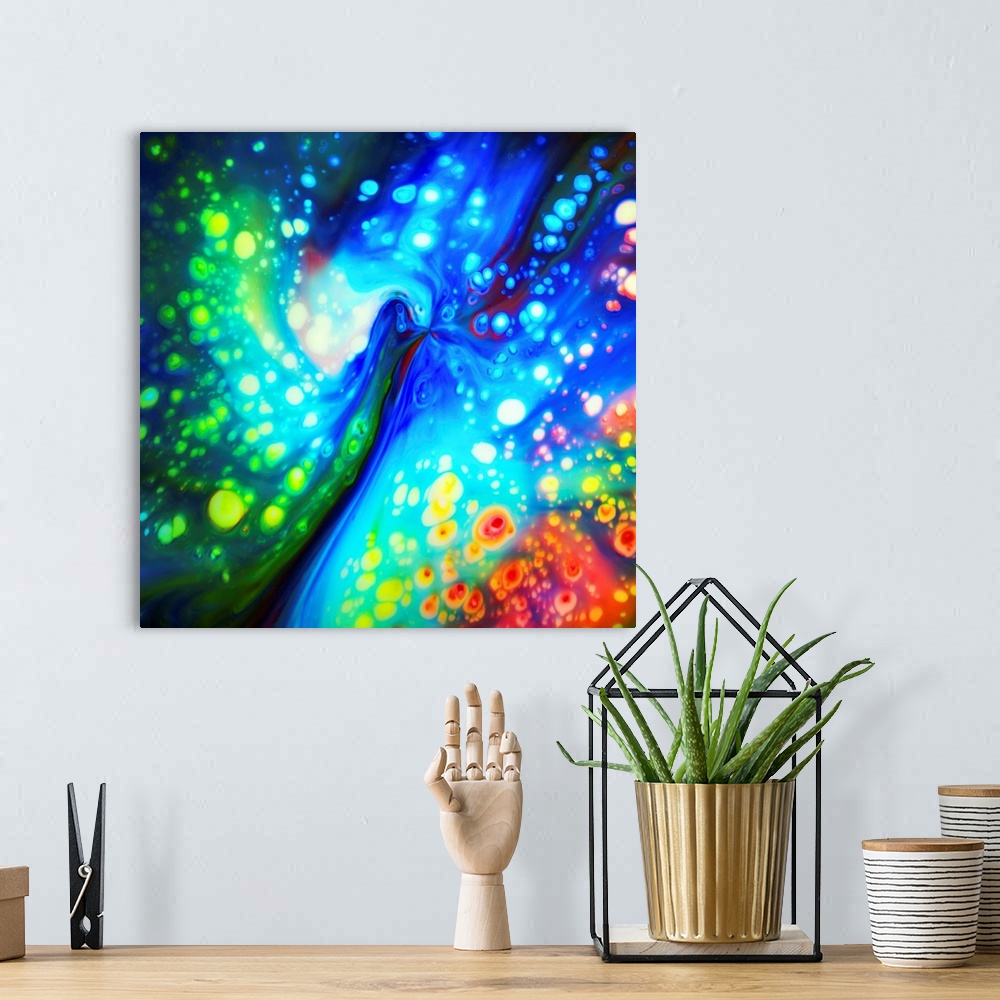 A bohemian room featuring Fine art photo of an abstract swirl of bright rainbow colors.