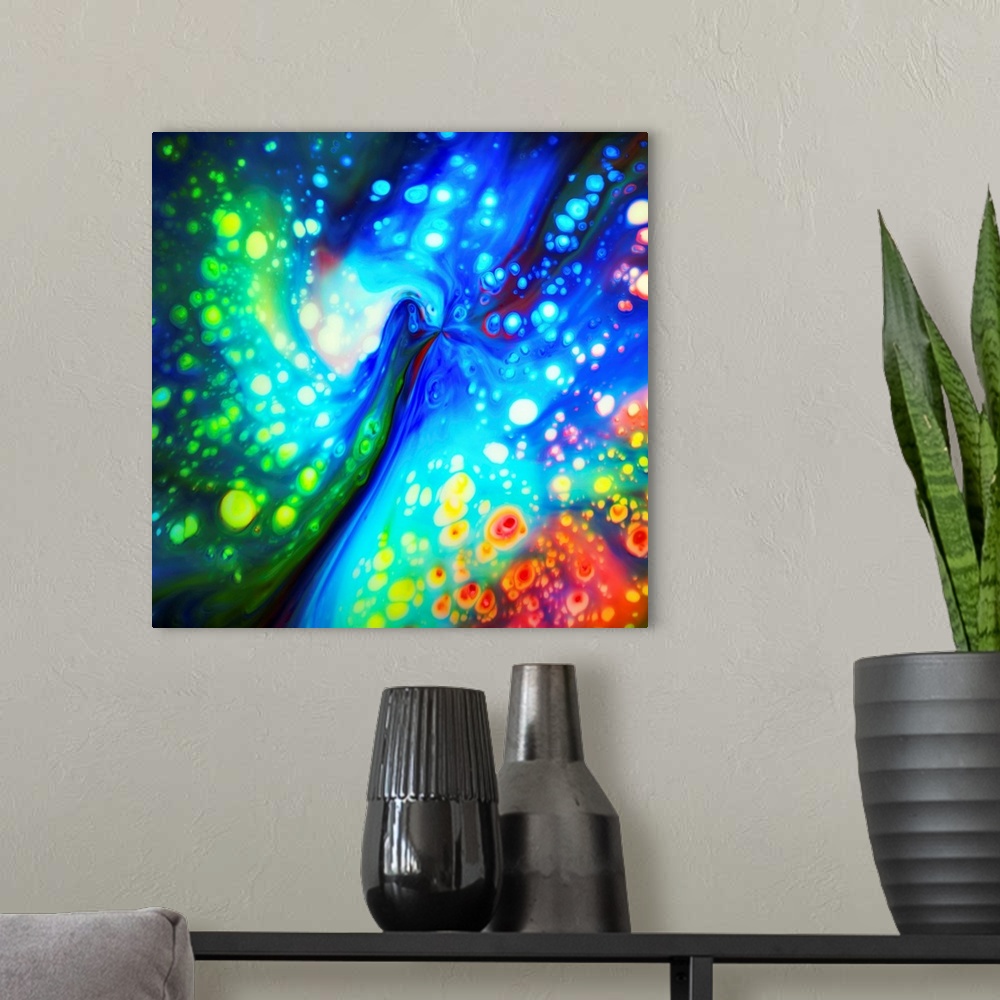 A modern room featuring Fine art photo of an abstract swirl of bright rainbow colors.