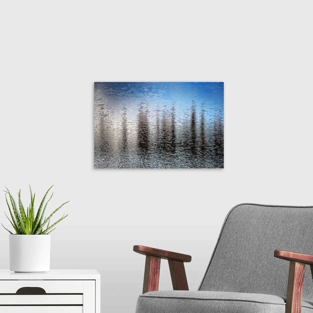 A modern room featuring Fine art photo of abstract shapes reflected in the rippling water of a lake.
