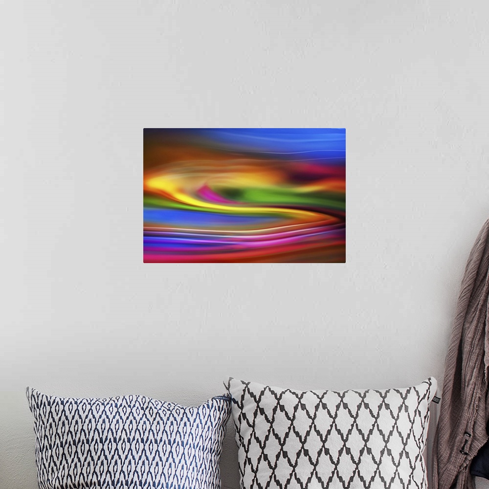 A bohemian room featuring Abstract photograph of blurred and blended neon rainbow colors and flowing lines.