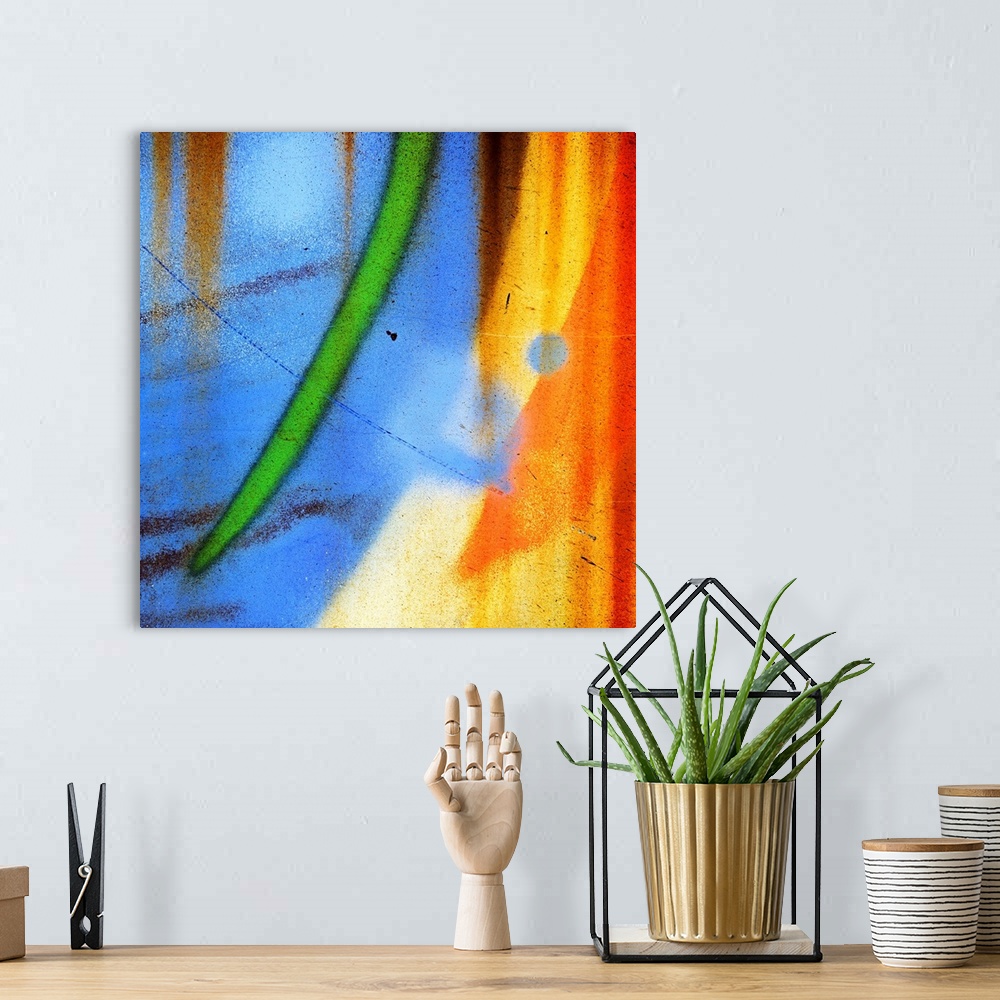A bohemian room featuring Abstract artwork created from a close up shot of graffiti on a wall, with curved streaks of blue,...