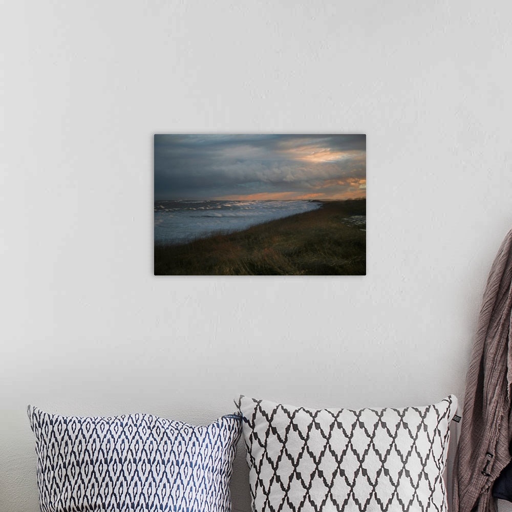 A bohemian room featuring Long exposure photograph of and ocean view with the warm setting sun.