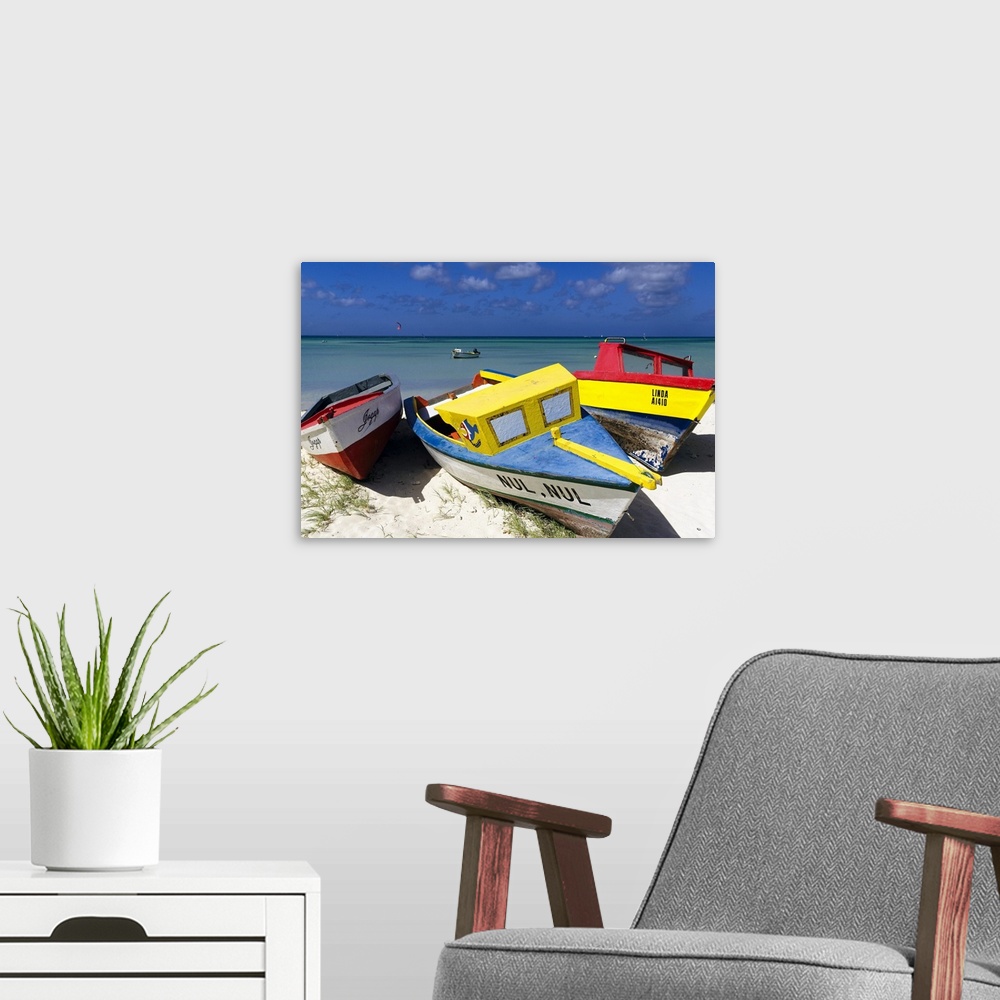 A modern room featuring A photograph of colorful boats sitting on the shore of a tropical beach.