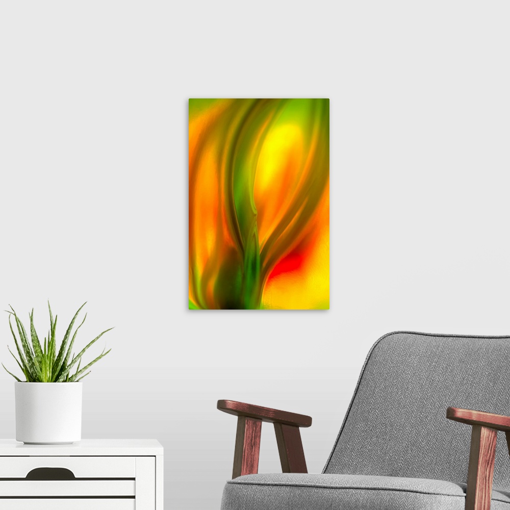 A modern room featuring Vertical, fine art, close up photograph of a vibrant tulip, the image is very soft and fluid with...