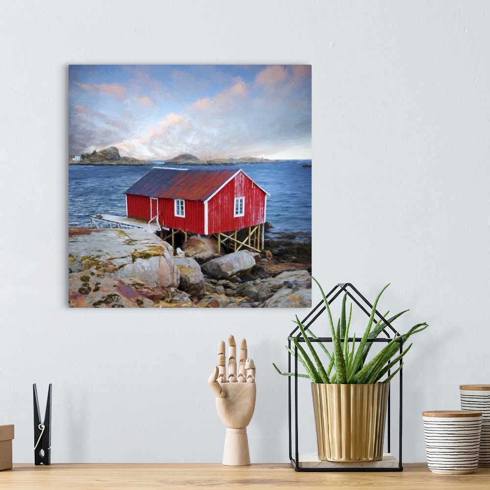 A bohemian room featuring A photograph of a red roofed building in a rugged mountainous landscape.