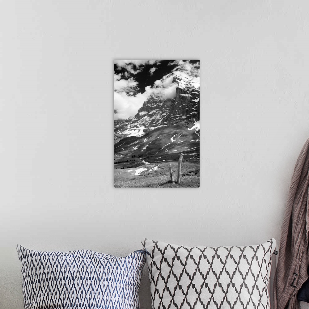 A bohemian room featuring Black and white photo of the Swiss Alps