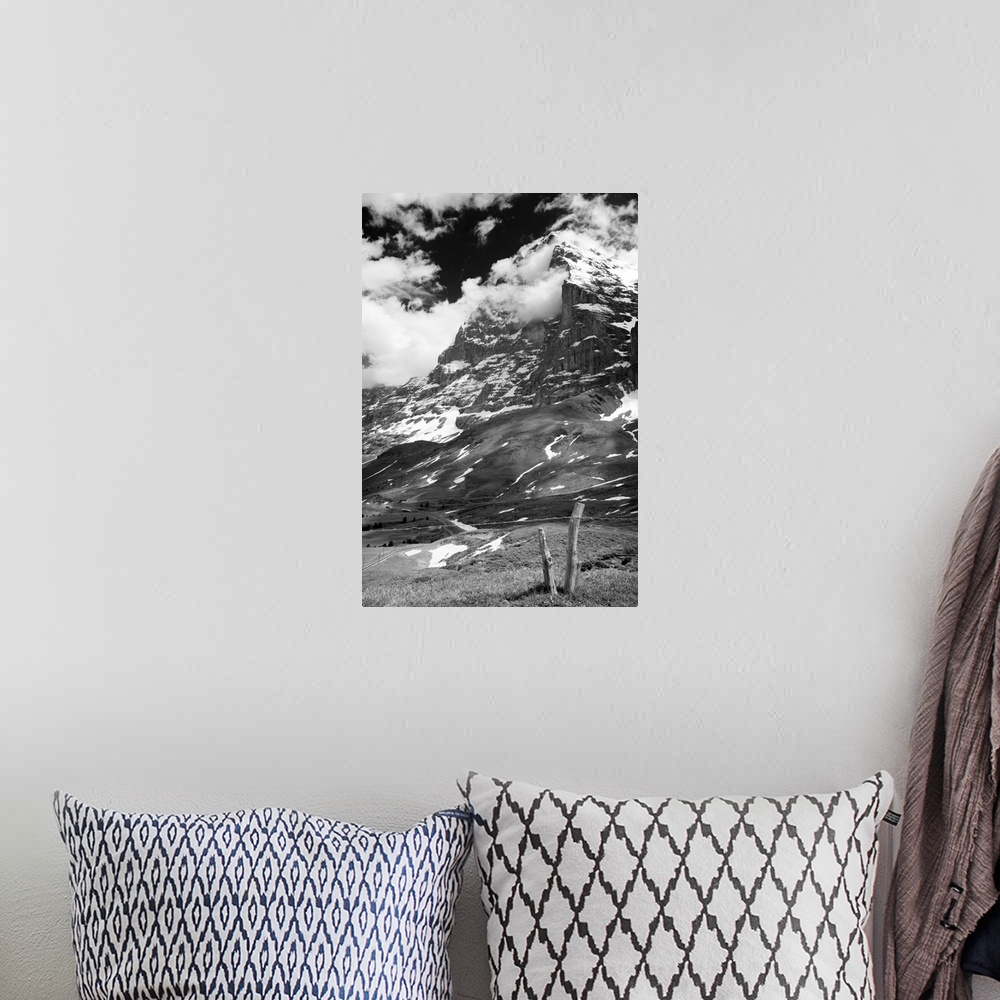 A bohemian room featuring Black and white photo of the Swiss Alps