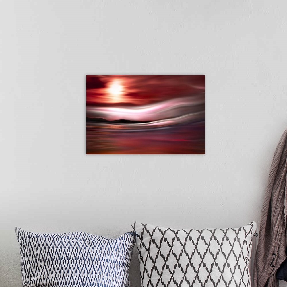 A bohemian room featuring Abstract photograph of a red, pink, and purple sunset in Vancouver with a mountain line silhouett...