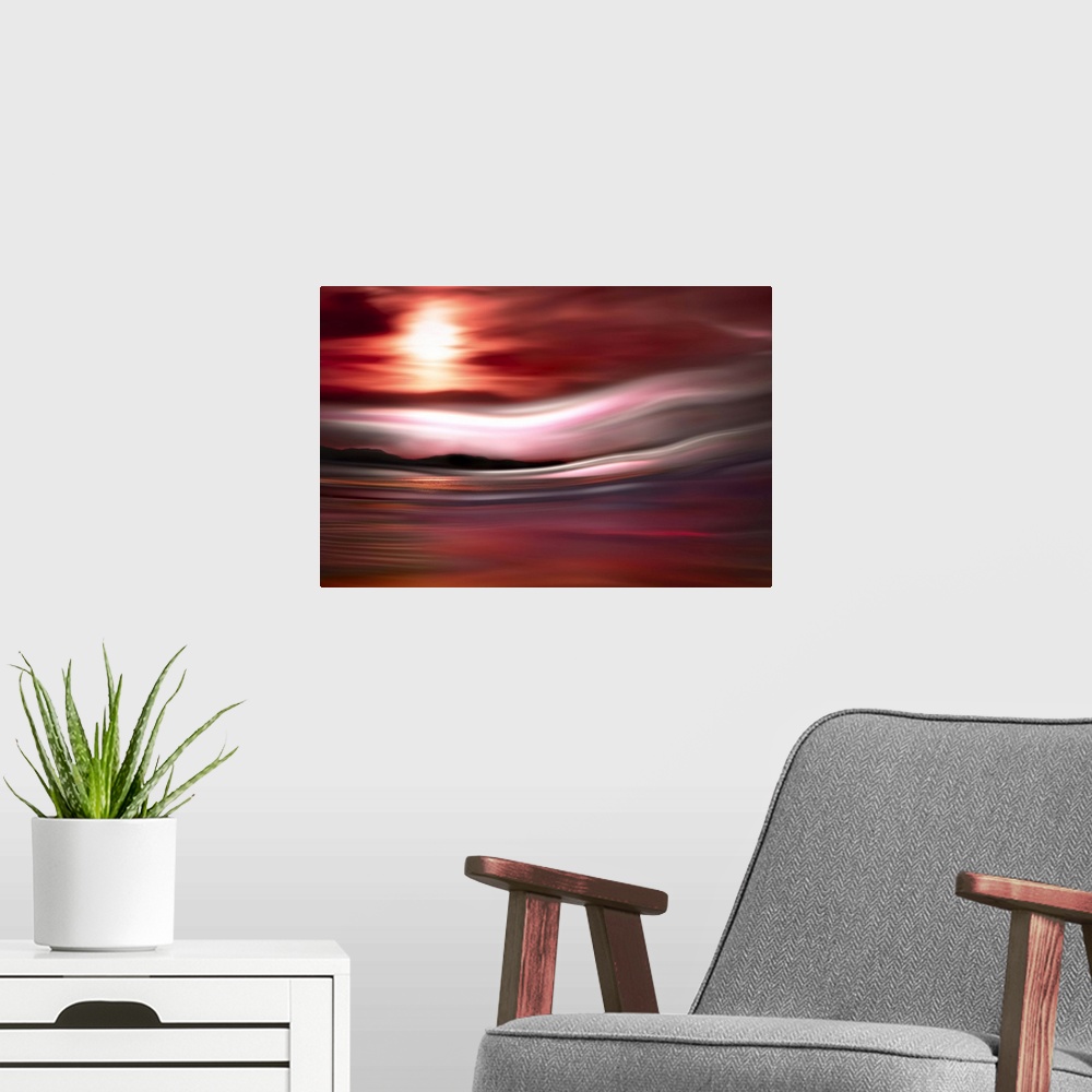 A modern room featuring Abstract photograph of a red, pink, and purple sunset in Vancouver with a mountain line silhouett...