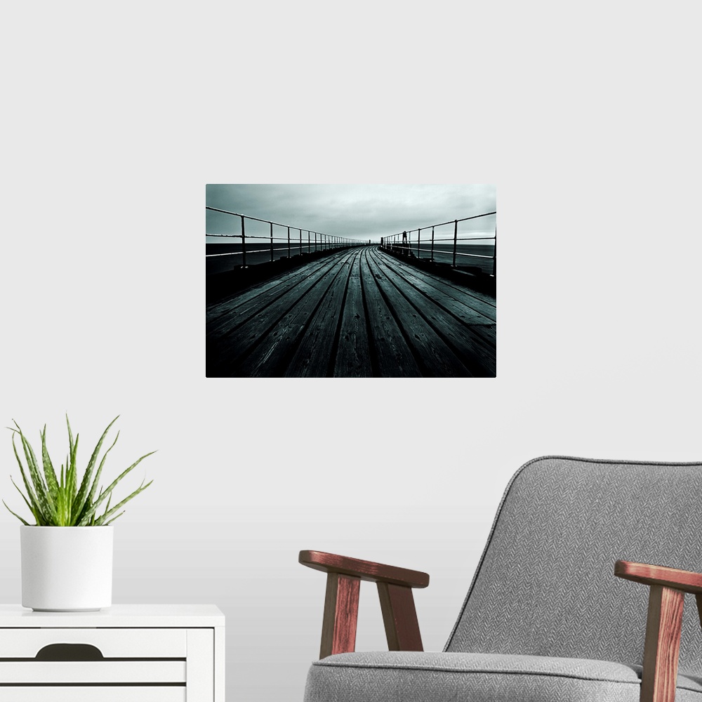 A modern room featuring Docor for the home or office of a photograph that has been taken staring down a pier that comes t...
