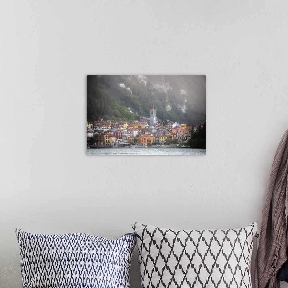 A bohemian room featuring The city of Varenna in Italy at the bottom of the Alps on the coast.