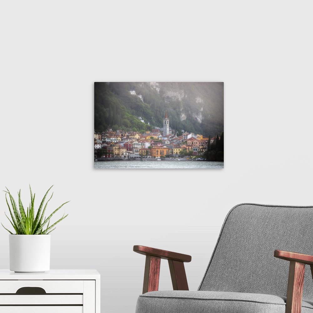 A modern room featuring The city of Varenna in Italy at the bottom of the Alps on the coast.