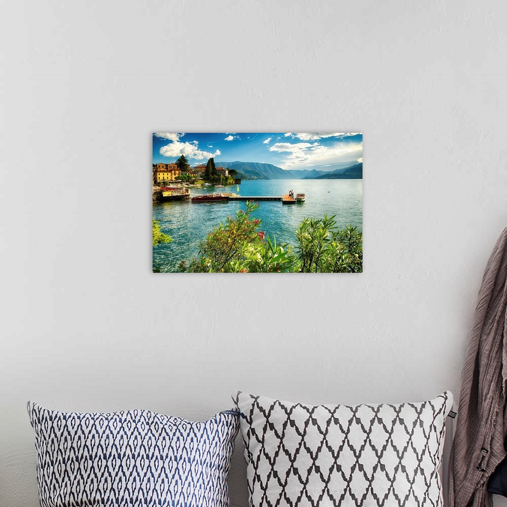 A bohemian room featuring Fine art photo of a pier leading out to the center of a lake in Italy.