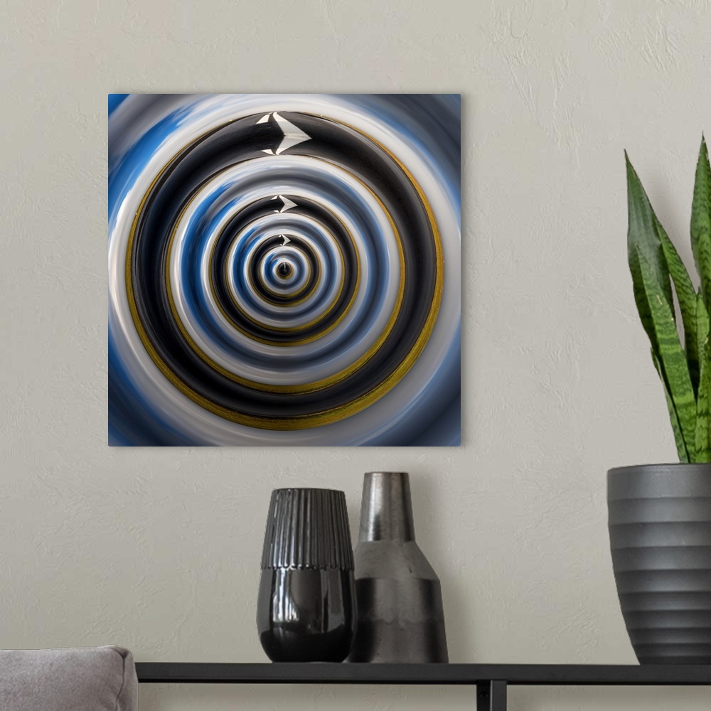 A modern room featuring Abstract artwork created by editing a photograph into a circular form.
