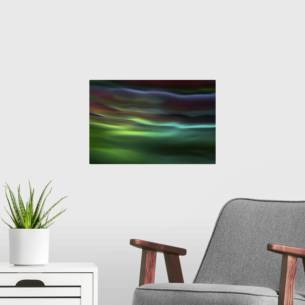 A modern room featuring Abstract photograph in green and blue shades resembling ocean waves.