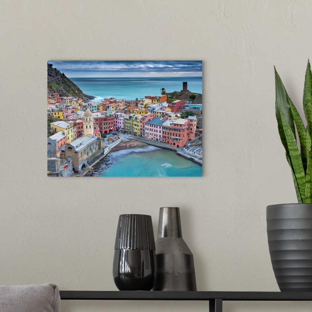 A modern room featuring Photograph of the harbor in the village of Vernazza in Cinque Terre, Italy.