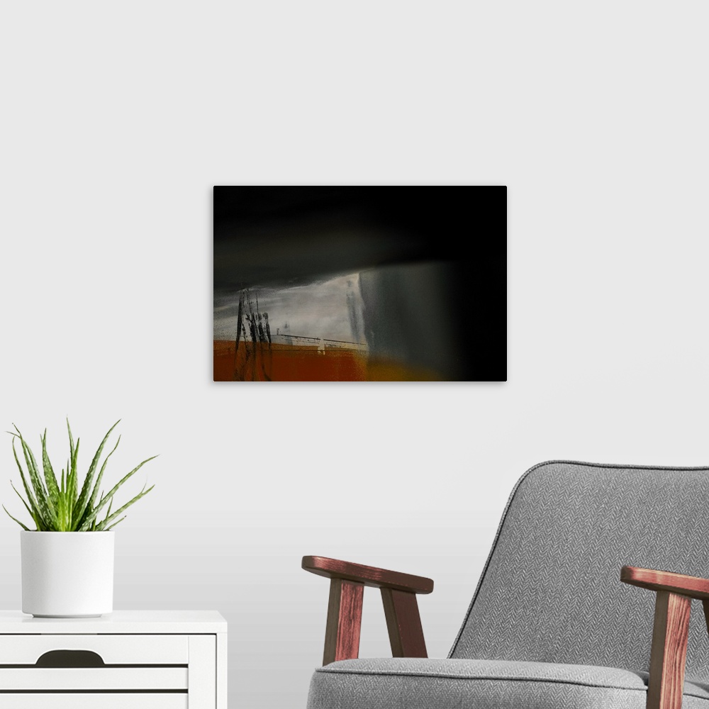 A modern room featuring Abstract photograph in black, red, gold, and gray.