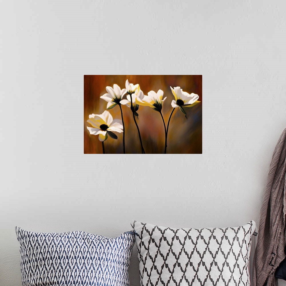 A bohemian room featuring Portrait of a group of white flowers against blurred, golden grasses. The stems and interiors of ...