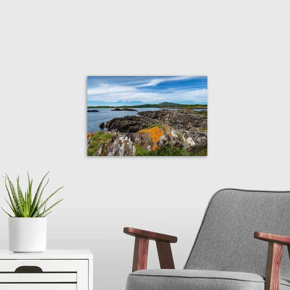 A modern room featuring Landscape by the sea with jagged rocks
