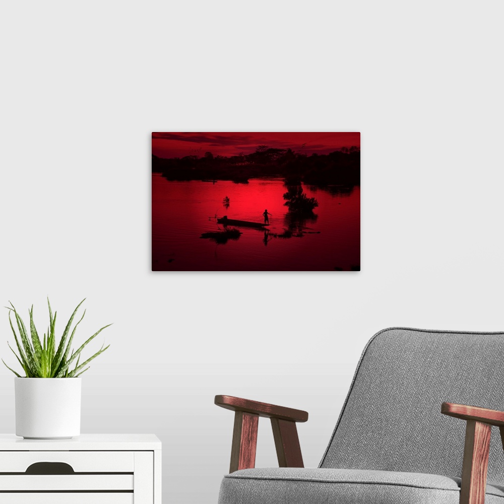 A modern room featuring Boat on the Mekong photographed with a red filter
