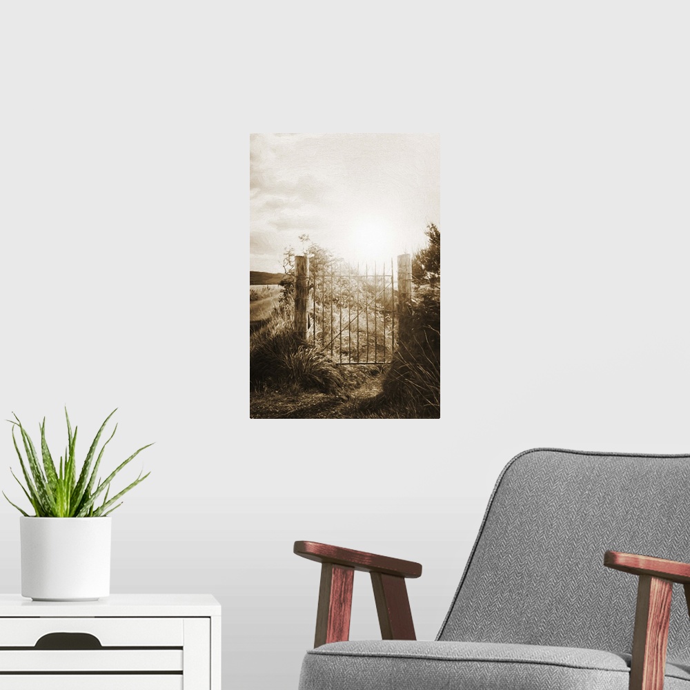 A modern room featuring A photograph of a gate fence gate silhouetted by a rising sun.