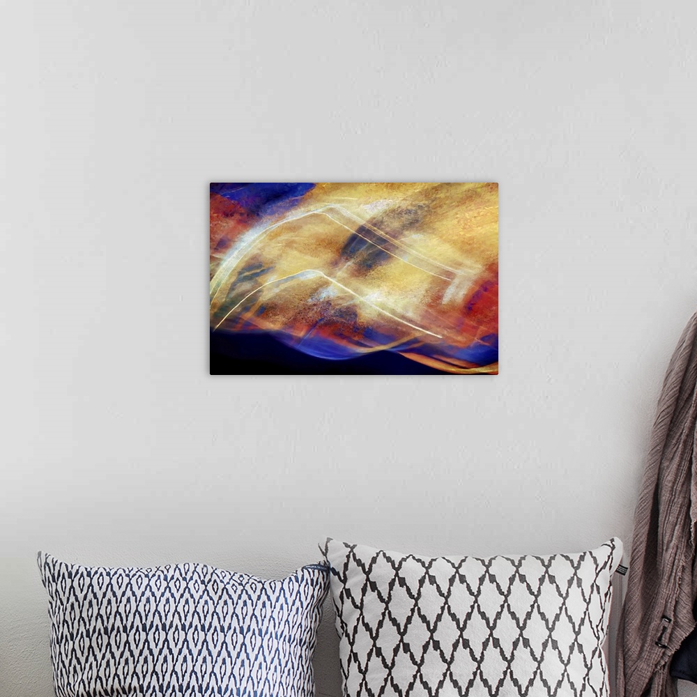 A bohemian room featuring Abstract interpretation of wild skies over mountains.