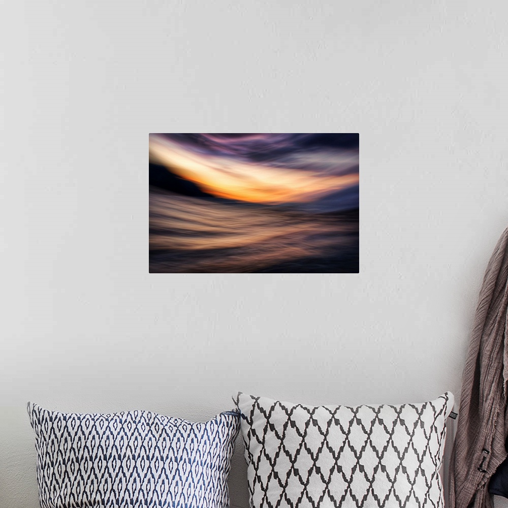 A bohemian room featuring Abstract image of Slocan lake in British Columbia, Canada, giving an impression of a sunset on th...