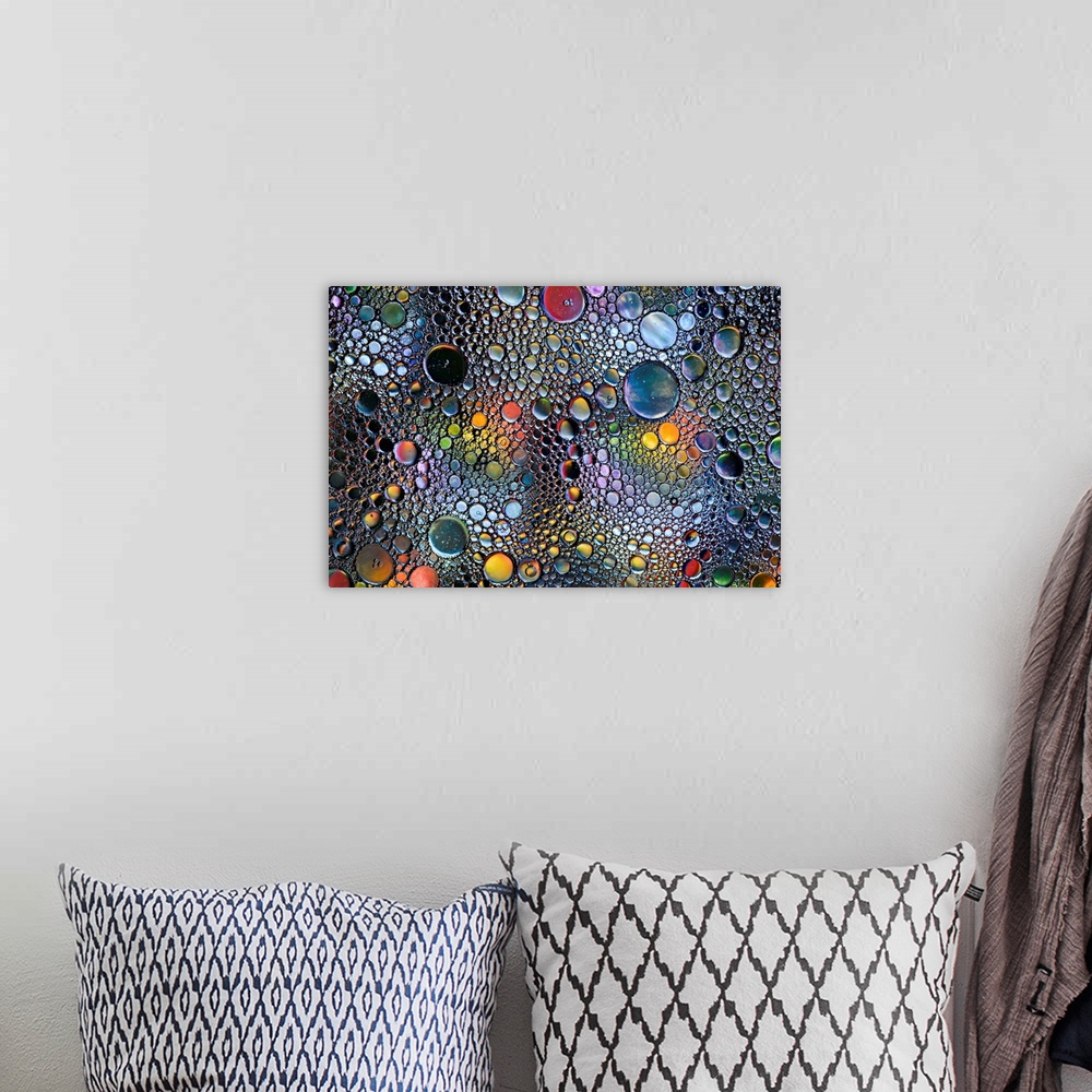 A bohemian room featuring Abstract photo of a multitude of bubbles in rainbow colors of different sizes.