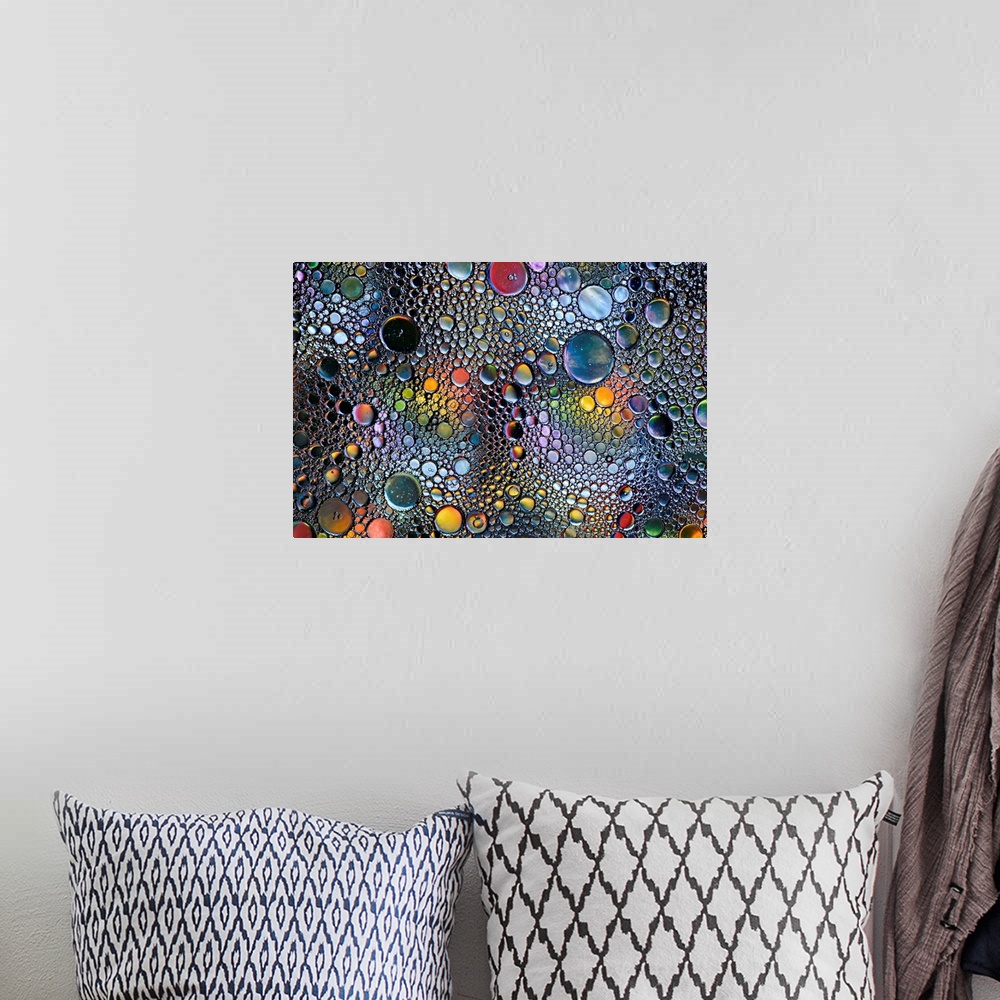 A bohemian room featuring Abstract photo of a multitude of bubbles in rainbow colors of different sizes.