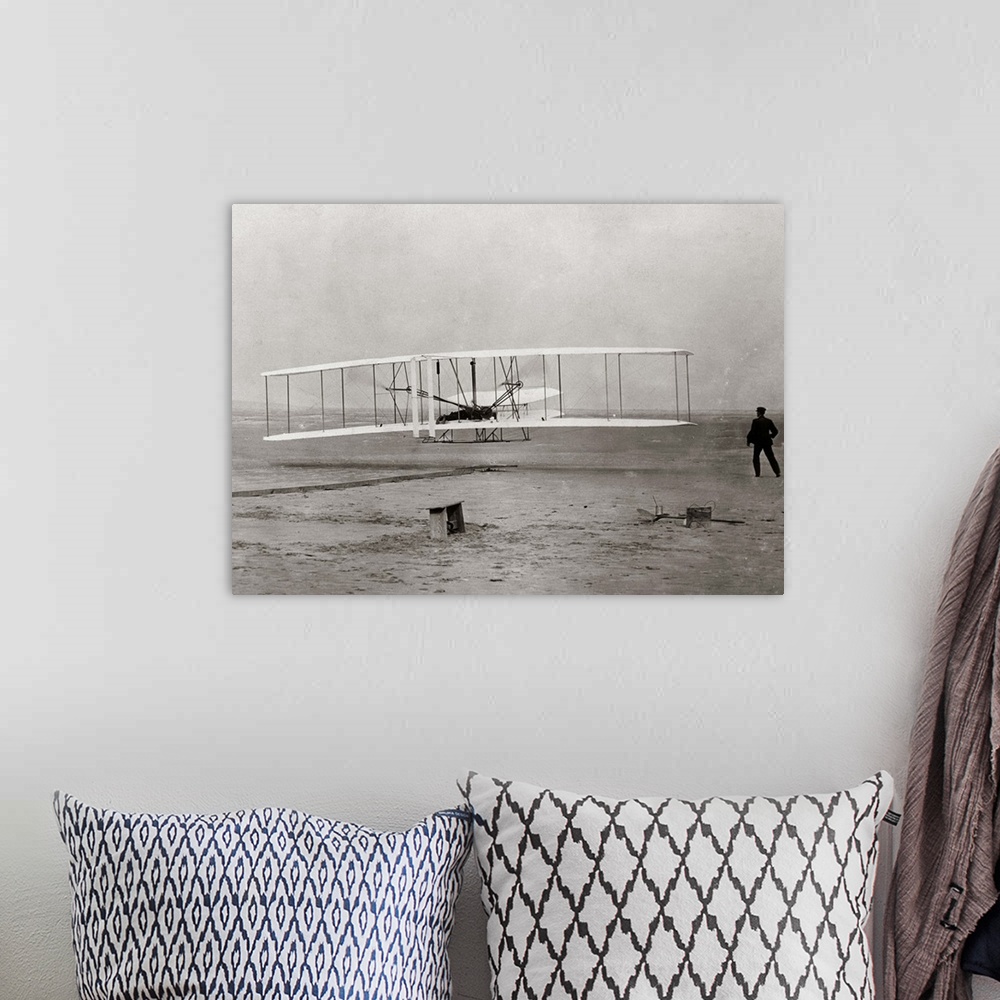 A bohemian room featuring 1903 Wright Brothers' Plane Taking Off At Kitty Hawk North Carolina USA.