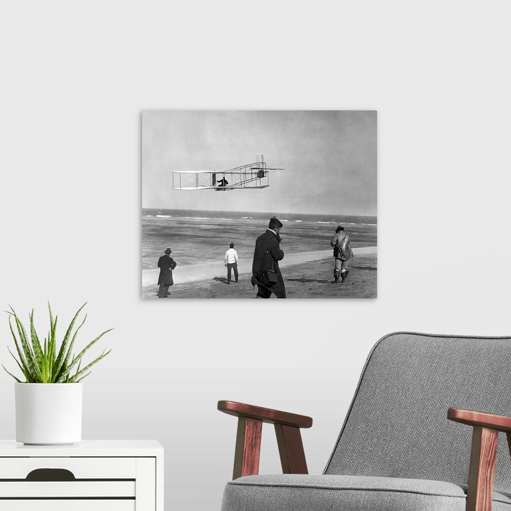 A modern room featuring 1911 One Of The Wright Brothers Flying A Glider And Spectators On Ocean Beach Kill Devil Hills Ki...