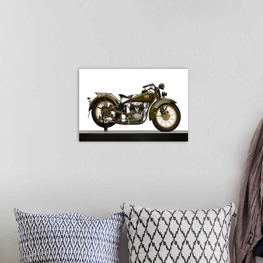A bohemian room featuring 1930 Excelsior 750cc Super-X, V-twin motorcycle.