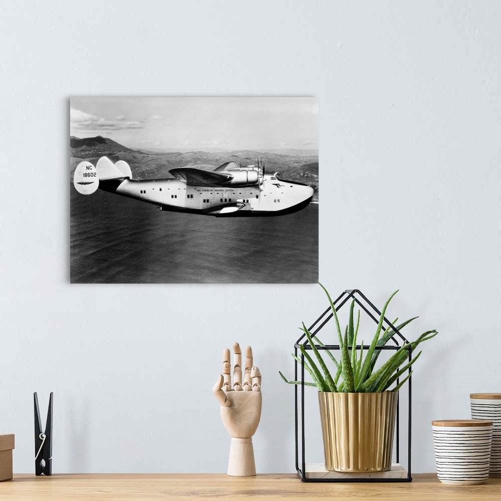 A bohemian room featuring 1930s 1940s Pan American Clipper Flying Boat Airplane In Flight.