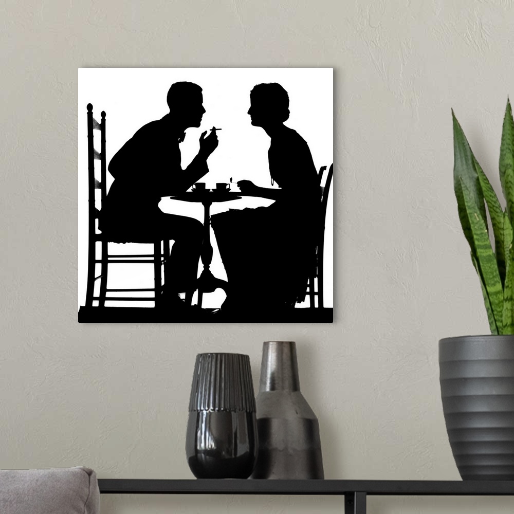 A modern room featuring 1930's Silhouette Of Couple Sitting At Tea Table