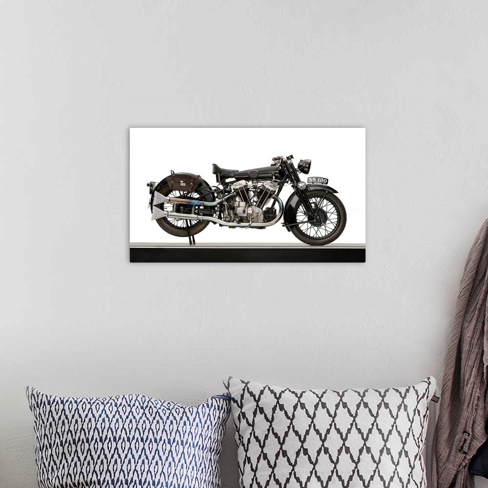 A bohemian room featuring 1931 Brough Superior SS100 JAP engine motorcycle.
