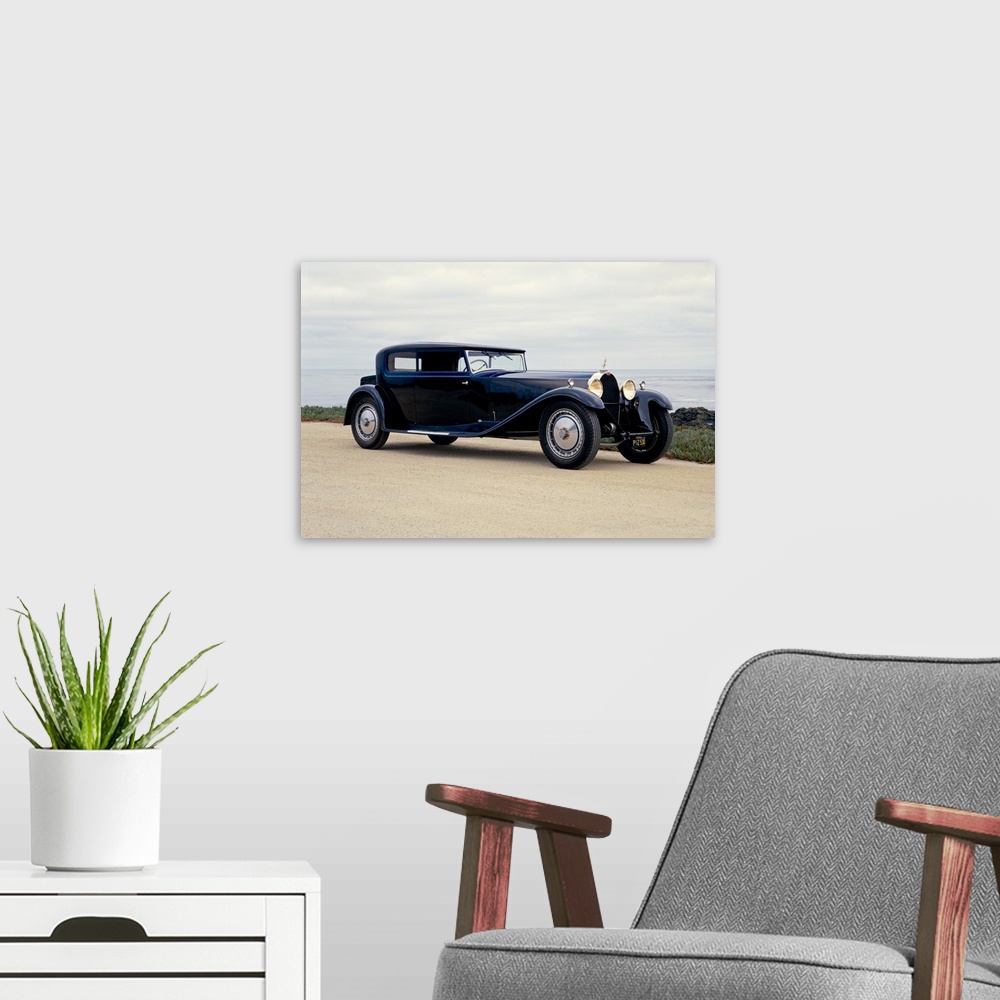 A modern room featuring 1931 Bugatti Royale 2-door hardtop.