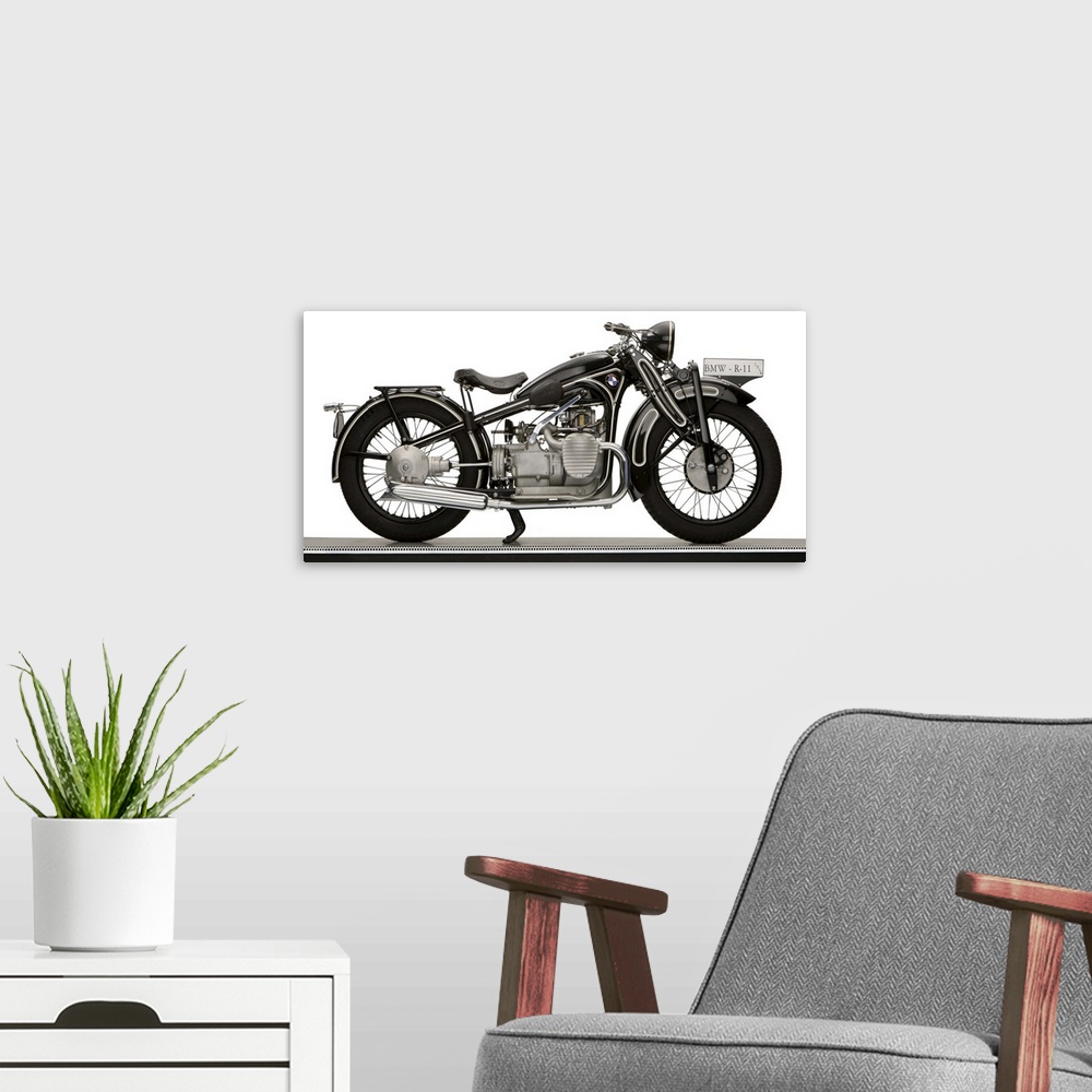 A modern room featuring 1934 BMW R11 730cc motorcycle.
